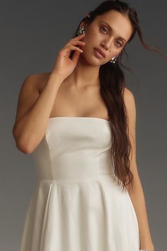 Ooooh aaaaah, that's Astoria: The strapless dress that turns heads and makes the cold shoulder look hot, hot, hot. | Astoria Midi Dress by Reformation in White, Women's, Size: 8, Cotton/Elastane at Anthropologie Glamorous Evening Dress With Built-in Bra, Formal Dress With Sweetheart Neckline And Built-in Bra, Glamorous Strapless Dress With Fitted Bodice And Straight Neckline, Strapless Fitted Maxi Dress, Glamorous Strapless Mini Dress With Fitted Bodice, Strapless Wedding Maxi Dress With Corset Back, Elegant Strapless Dress With Built-in Bra For Night Out, Strapless Ball Gown With Boned Bodice, Glamorous Fitted Off-shoulder Dress With Sweetheart Neckline