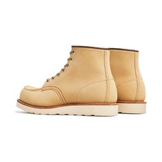 When most people think of "Red Wing Boots", they're likely thinking of Classic Moc. The workwear staple was first introduced in 1952, yet this 6" Hawthorne roughout leather colorway still has a contemporary edge. Heritage details include the namesake Moc toe, Goodyear leather welt construction, nickel eyelets, triple stitching, and a Traction Tred outsole. Capable of being re-soled, it's built to last for years and is proudly made in the USA. Sizing note: As with all Red Wing Heritage Classic Mo Wing Boots, Red Wing Boots, Red Wing, Red Wings, James Bond, Work Wear, Boots, Red, Leather