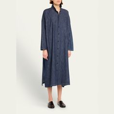 Eskandar wide a-line denim shirtdress Double stand collar Button closure  Long sleeves; approx. 18.3"L Side slits  Full length A-line silhouette Cotton Unlined Dry clean, machine wash tumble dry, wash separately Made in Poland Denim Shirt Dress With Buttons For Daywear, Relaxed Fit Denim Dress With Buttons For Daywear, Wardrobe Sale, Travel Size Perfume, Evening Flats, Cocktail Jacket, Sisley Paris, Denim Shirt Dress, Clean Machine