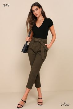 Your style game just got that much better thanks to the Lulus Leo Olive Green Tie-Waist Cropped Pants! Lightweight, stretch twill constructs these casual-chic pants that are perfect to take you from work to play. A high-waist, with sash tie allows a custom fit, while tapered legs and a cropped length creates a slimming-effect. Utility pockets finish the look. Hidden snap buttons and zip fly. Fit: This garment fits true to size. Length: Ankle length. Size medium Inseam: 24.25 Front Rise: 13.50 Wa Womens Smart Casual Outfits Summer, Summer Chic Looks, Professional Wardrobe Women, Fitness Professional Attire, Cute Summer Outfits Women In 30s, Business Casual With Tshirt, Comfortable But Stylish Outfits, Athletic Wear For Women, Classy Fashion Outfits Women