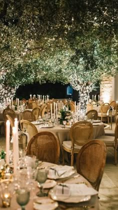 an outdoor dining area with tables and chairs