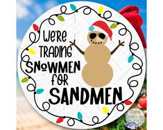 a sticker that says, we're trading snowmen for sandmen on the beach