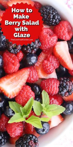 berries and raspberries in a bowl with the words how to make berry salad with glaze