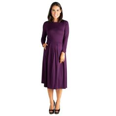 This classic, timeless style features an A-line skirt with large pleats, a round neckline, long sleeves, and midi length. The fit and flare maternity dress can be accessorized to match any personality or worn alone in its simplicity. The beautiful color options and fit make for a timeless look. Color: Purple. Gender: female. Age Group: adult. Solid A-line Pleated Dress, Solid A-line Dress With Pleated Waist, Fall A-line Midi Dress With Pleated Sleeves, Pleated Midi Dress For Fall, Fall Pleated Solid Midi Dress, Classic Long Sleeve Dresses, A-line Midi Dress With Pleated Back, Solid Midi Dress With Pleated Long Sleeves, Solid A-line Midi Dress With Pleated Sleeves