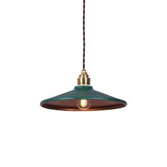 a green and brown light hanging from a ceiling fixture with a cord attached to it