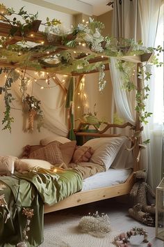 a bedroom with a canopy bed covered in greenery and fairy lights on the ceiling