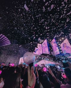 confetti is thrown in the air at a concert