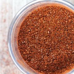 an overhead view of a blender filled with spices