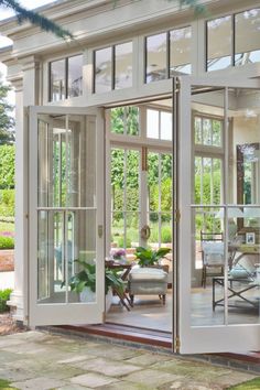 the inside of a house with glass doors