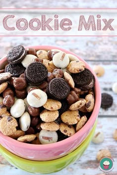 a bowl filled with cookies mix on top of a table