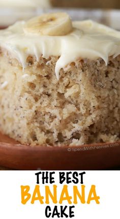 the best banana cake with cream cheese frosting is cut in half and ready to be eaten