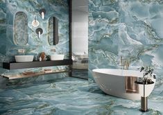 a bathroom with blue marble walls and flooring