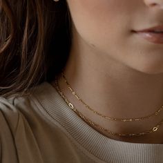 Our Clara Chain's delicate lace pattern adds a pretty shine to your look. This light-catching necklace is available in 14k gold fill or sterling silver and makes a lovely layering necklace or wear it alone for a low key sparkle. DETAILS 14k gold fill or sterling silverAvailable in 14", 16", or 18"Hypoallergenic, water proof, and nickel free Minimal Choker, Layering Necklace, Hook Clasp, Handmade Fashion, Super Sweet, Lace Pattern, Low Key, Layered Necklaces, Metallic Silver