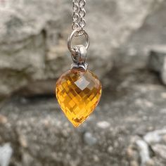 The natural yellow citrine necklace stands out with a large, uniquely shaped citrine stone. Perfect choice for a November Birthstone Necklace, Necklace For a Son, Necklace For a Daughter, or Yellow Crystal Necklace.  Why this necklace: - Large Beautiful stone and exquisite craftsmanship - As the birthstone for December, this Citrine necklace makes a perfect gift for someone special born in that month. - This jewelry embodies the owner's strength and personality.  Item Detail: - Stone: Natural Ye Son Necklace, Necklace For Daughter, November Birthstone Necklace, Crystal Point Necklace, Necklace Stand, Citrine Necklace, Yellow Citrine, Citrine Stone, Citrine Crystal