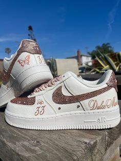 The perfect shoes for any wedding, birthday, anniversary, or other occasion! Shine with these pink and rose gold/gold custom Air Force ones! These shoes feature ribbon laces, over 500 jewels, and customized name and number. Add any unique details to your shoes to make them one of a kind! Rush orders are available upon request as well as different colors and designs! Pink And Gold Shoes, Rose Gold Quinceanera Shoes, Pink Custom Air Force, Custom Air Force Ones, Customize Shoes, Rose Gold Nikes, Quinceanera Shoes, Casual Shoes Women Sneakers, Quinceañera Ideas