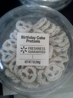 birthday cake pretzels are in a plastic container