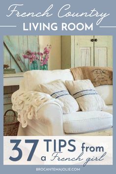 a white couch sitting in front of a table with flowers on it and the words 37 tips from a french country living room