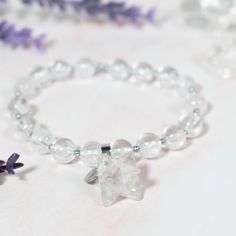 This crystal bracelet is made of natural Clear Quartz and has a beautiful Merkaba charm. Our Crystal Bracelets are designed to feel lightweight, comfortable, and effortless.Stringing each crystal beads is part of our mindful Intention when we create this bracelet, infusing positive energies, love, and happiness within each design.By combining meaningful symbols and natural crystals, we give this accessory relevance in every way. Clear Quartz | Clarity, Awareness & HealingClear Quartz is a st Silver Gemstone Crystal Bracelet For Meditation, Silver Spiritual Crystal Bracelet For Healing, Spiritual Crystal Beaded Bracelets For Healing, Crystal Gemstone Bracelet As Gift, Spiritual Faceted Stretch Bracelet As A Gift, Crystal Gemstone Bracelet Perfect For Gifting, Spiritual Stretch Bracelet With Faceted Details As Gift, Spiritual Stretch Bracelet With Facets As Gift, Faceted Spiritual Crystals For Gifts