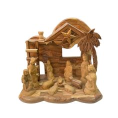 a nativity scene made out of wood