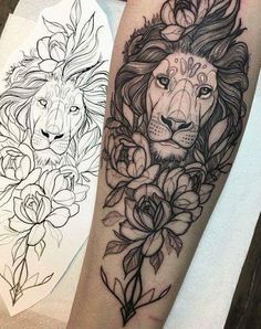 a lion and rose tattoo on the left arm, with another one in the background