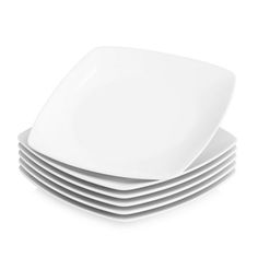 white plates stacked on top of each other