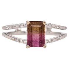 This beautiful ring features a 1.08 carat bicolor emerald cut tourmaline gemstone with natural earth mined diamonds, all set in solid 14K gold. This ring can be a lovely October birthstone gift for your loved ones! Specifications Item Type: Ring Center Stone: Tourmaline Treatment: Heated Weight: 1.08ct Head size: 7x5mm Shape: Emerald cut Hardness: 7-7.5 Metal: 14k/2.848g Diamond Clarity/Color: SI / G-H Diamond Count/Weight: 10/0.6 cttw SKU: AJR838/1383 This ring is made with solid 14K Gold and n Vera Wang Engagement Rings, White Engagement Ring, Contemporary Engagement Rings, Yellow Engagement Rings, Modern Engagement Rings, Engagement Rings Platinum, Gemstone Engagement, Platinum Engagement Rings, Deco Engagement Ring