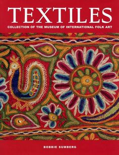 the cover of textiles, with an image of flowers and paisleys