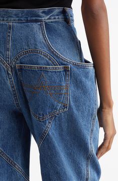 The NYC-based label gets extragenerous with these nonstretch denim jeans distinguished by flared pockets and a signature heart-shaped seam at the back. Zip fly with button closure Front coin pocket; side scoop pockets; back patch pocket 100% cotton Dry clean Imported Designer Clothing Side Zip Jeans, Curated Decor, Pocket Jeans, Medium Blue, Patch Pocket, Side Zip, Denim Jeans, Designer Clothing, Coin