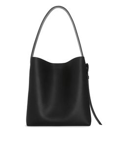 Leather Tote - Black - ARKET WW Sleek Tote Satchel For Everyday Use, Sleek Satchel Tote For Everyday Use, Modern Leather Bucket Bag With Large Capacity, Sleek Tote Bag With Adjustable Strap, Sleek Double Handle Satchel For Everyday, Large Capacity Bucket Shoulder Bag For Work, Sleek Tote Satchel With Detachable Handle, Sleek Satchel With Detachable Handle In Tote Shape, Sleek Satchel With Detachable Strap In Tote Shape