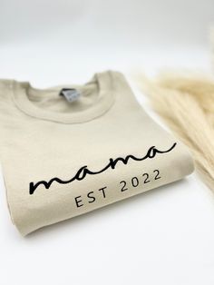 Custom Year Embroidered Mama Sweatshirt or Hoodie, Mama Est 2022, Mama Est 2023, Mothers Day, Gift for Mom, Mom Life Crewneck, Gift for Her 💕WELCOME TO Love Stitches Co If you are looking for soft, comfy, first-rate sweatshirts, you're in the right place! Here at Love Stitches Co, we love what we do and strive to make your shopping experience just right for you. If you have any questions, concerns, or comments about our products, feel free to shoot us a message anytime. Even on weekends and holidays, we'll try our best to respond as quickly as possible! Product Details Unisex Sweatshirts: - Gildan Brand -50% cotton - Light/medium weight and soft, this sweatshirt is sure to be your next favorite sweatshirt. 💕Sizing and Coloring Please make sure you select the right color and size for you Crew Neck Cotton Hoodie For Mother's Day, Crew Neck Cotton Hoodie, Cotton Sweatshirt With Lettering For Gift, Embroidered Products, Mothers Day Shirt, Love Stitch, Mama Sweatshirt, Mothers Day Shirts, Crew Shirt