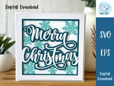 a christmas card with the words merry christmas on it and snowflakes in blue