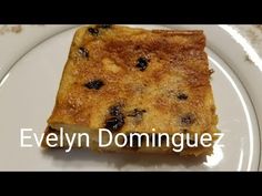 a piece of cake on a plate with the words evelyn dominguez above it