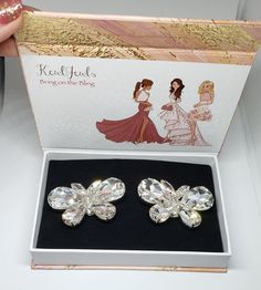 "Elegant Clip On Shoe Jewels Adorned with Beautiful Rhinestones in a Pretty Butterfly Shape Easily take your shoes to the next level by clipping on these shoe jewels to the tops or sides of shoes. Easy to use and instantly elevates shoes to go from an every day look to an evening out! Includes beautiful box pictured and makes a great birthday or Christmas gift! Alloy, Rhinestones Approx. 2.25\" x 1.5\" each shoe jewel Let me know if you have any questions; happy to help!" Butterfly Shoe, Silver Shoe, Butterfly Shoes, Pretty Butterfly, Butterfly Shape, White Rhinestone, Silver Shoes, Shoe Clips, Silver Pearls