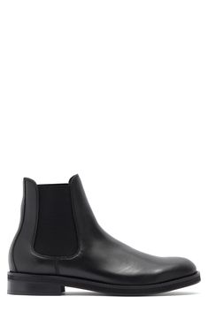 A plain-toe Chelsea boot constructed from smooth leather features dual inset elastic gores for easy-wear comfort. Leather and textile upper/leather lining and sole Made in Italy Casual Chelsea Boots In Calf Leather With Plain Toe, Classic Black Chelsea Boots With Lug Sole, Leather Chelsea Boots With Rubber Sole For Work, Business Leather Boots With Contrast Sole, Business Boots With Contrast Sole, Plain Toe, Casual Calf Leather Slip-on Chelsea Boots, Casual Slip-on Chelsea Boots In Calf Leather, Leather Moc Toe Boots With Contrast Sole, Leather High-top Chelsea Boots With Leather Lining