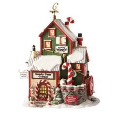 a christmas house with candy canes and other decorations