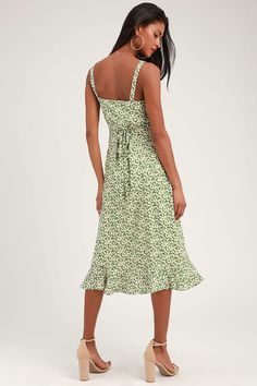 Lulus Exclusive! The Lulus Darling Daisies Green Floral Print Midi Dress has us dreaming of sunny days spent picking flowers! Lightweight, woven fabric, in a ditsy white, yellow, and blue daisy floral print, falls from wide straps, into a button-front triangle bodice and a midi skirt with a high, fitted waist and ruffle trimmed hem. Tying detail at back allows a custom fit. Hidden side zipper. Fit: This garment fits true to size. Length: Knee to mid-calf length. Size small measures 46" from shou Casual Night Out Outfit, Green Floral Print Dress, Midi Dress Formal, Green Floral Print, Floral Print Midi Dress, Print Midi Dress, Midi Dress Party, Midi Cocktail Dress, Night Out Outfit