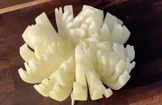 chopped white potatoes on a cutting board ready to be cooked