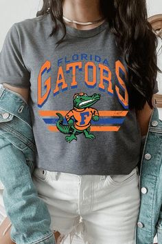 FLORIDA GATORS,FOOTBALL UNISEX SHORT SLEEVE,GRAPHIC TEE,GRAPHIC TSHIRTS,TSHIRTS,TEES100%COTTON,HEATHER(52%COTTON,48%POLY),ATH.HEATHER,BLACK HEATHER(90%COTTON,573%POLY)NICARAGUAMade In: Nicaragua Casual Green Tops For Game Day, Green Casual T-shirt For Game Day, Florida Gator Outfits, Florida Gator Vinyl Shirts, Florida Gators Shirt, Florida Gators Apparel, Florida Gators Baseball, Concealed Carry Handbags, Florida Gators Football