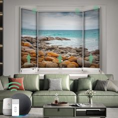 a living room filled with furniture next to a window covered in rocks and seaweed