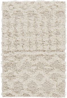 a white rug with fringes on it