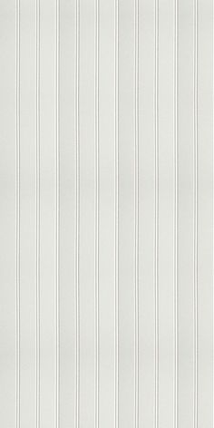 a white striped wallpaper with vertical stripes