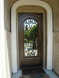 a door with an iron design on it