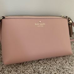 Only Been Used A Few Times! Great Quality! There Is A Rose Gold Tassel Attached To The Zipper! Inside Is Fully Clean Almost Looks Brand New! Great Condition! Taking Offers! Kate Spade Pink Bag With Zipper Closure, Pink Kate Spade, Bag Light, Kate Spade Bags, Kate Spade Bag, A Rose, Pink Gold, Pink And Gold, Crossbody Bags