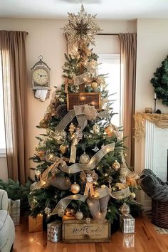 a decorated christmas tree in the corner of a living room with gold and silver decorations