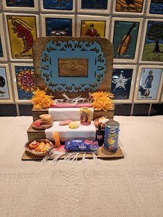 a table topped with donuts and drinks on top of a bed