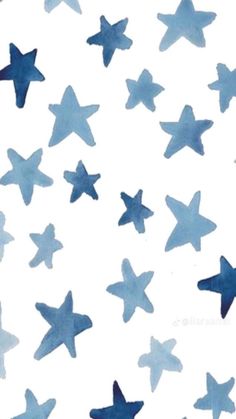 blue watercolor stars are flying in the air