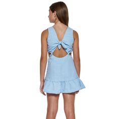 Little Peixoto Blair cut-out dress in blue cotton skies. Dress features cut-out accents, knotted details, and a ruffle hem. Pullover style. Imported. Size Conversion: (XS = 2/4), (S = 6/8), (M = 10/12), (L = 14). Chic Blue Dress With Bow Tie Back, Light Blue Summer Mini Dress With Ruffle Hem, Light Blue Summer Mini Dress With Tie Back, Light Blue Tie Back Mini Dress For Beach, Light Blue Tie Back Mini Dress For Spring, Light Blue Casual Mini Dress With Tie Back, Casual Light Blue Mini Dress With Tie Back, Beach Cotton Dress With Bow Tie Back, Light Blue Ruffle Hem Dress For Vacation