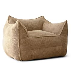 a brown dog bed with a large pillow on top of it's back end