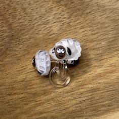 Tiny clip on earrings. Little plastic sheep less than1 cm across. Invisible (clear plastic) clip on closures.  Lightweight.  Earrings are not intended to be worn while sleeping bathing or swimming. Not recommended for children. See more: https://www.etsy.com/ca/shop/CleverLittleEars CANADIAN PRICES INCLUDE GST/HST WHERE APPLICABLE. ETSY WILL CALCULATE ANY PST OWING AT CHECKOUT. While the cost of shipping makes returns or exchanges impractical, please do contact me with any concerns about your or Plastic Clips, Lightweight Earrings, Earrings White, Clear Plastic, Clip On, Clip On Earrings, Sheep, Etsy Earrings, Jewelry Earrings