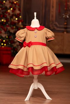 Do you look for a cutest Christmas Toddler Girl Gingerbread Dress ? This Dress is perfect for your photo shoots, christmas pictures and for a gift ! Your little princess will receive many compliments and such trendy look will underline her beautyness.  This Gingerbread dress is puffy with built in layers of red and white tulles! All of the details of this fantastic dress is handmade.  We create this dress with premium quality fabrics, completely lined so she will be comfortable all day. You will have perfect pictures with Santa, family photos and Holiday school parties. She will be happy with her fluffy puff skirt dress! You will see the quality of the fabrics and dress when you touch it! We have our own standard sizes for this item 1 years to 5 years but ıf you want to order a custom size Gingerbread Outfit, Gingerbread Dress, Girl Gingerbread, Dress Twirl, Photo Shoot Dress, Fantastic Dress, Fluffy Puff, Toddler Christmas Dress, Fairycore Dress